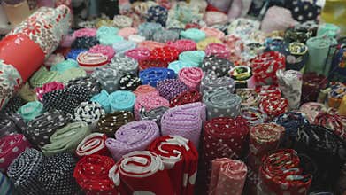 Rolls of Colorful Fabrics in Vibrant Colors, Close Up