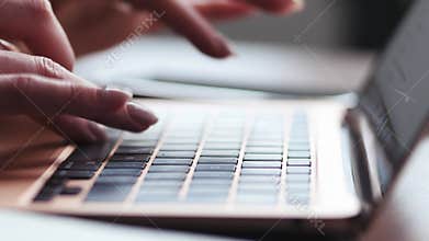 Young female hands texting on laptop keyboard close up. Busy business woman emailing to client remotely use digital