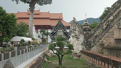 view to ancient ruin pagoda building of Chedi Luang temple in city center of Chiangmai in Thailand under cloudy day time