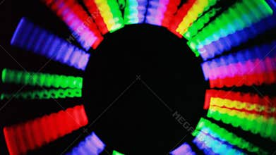 staffs rotate on circle in the dark blinking