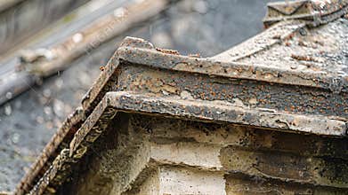 Jagged edges and sharp corners give the impression of a once strong structure now worn down by wind and rain
