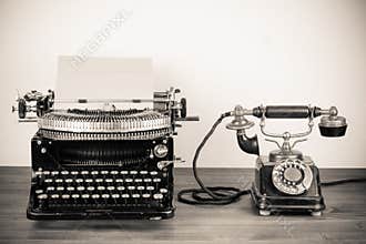 Vintage typewriter and telephone