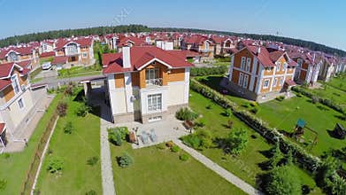 Many similar houses in gated development at sunny