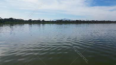Beautiful scenery of Lake Naivasha with flooded trees against the background of the blue cloudy sky. Kenya, Africa. top