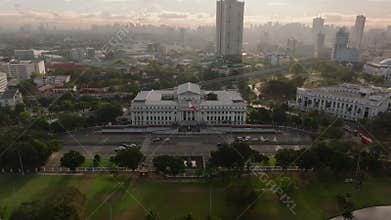 Aerial view of National Museum of Fine Arts in Manila during dusk, featuring its classic architecture against a colorful