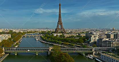 Aerial panning view of the historic center of Paris with the Eiffel Tower at summer day. Panorama of Paris from above