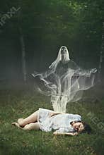 Soul of a sleeping woman in the forest