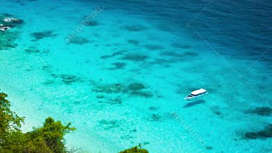 Tropical sea creek with yacht