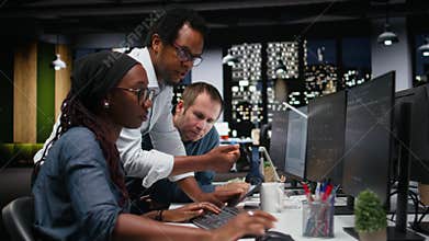 Programmers working together in Silicon Valley company office