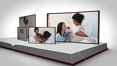 Family videos on a book against a white background