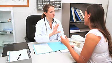 Doctor giving a bottle of drugs