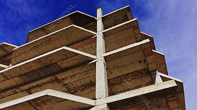 Structural design of concrete building in aerial view under clear sky