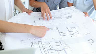 Pretty interior designer working with clients