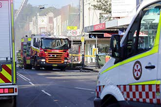 Fire and ambulance crews attend shop blast tragedy