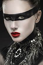Gothic woman with creative black makeup
