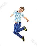 Little boy jumping on white background