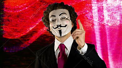 Man with v for vendetta mask