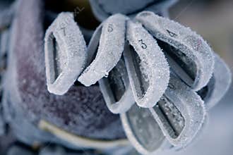Golf Clubs Covered in Thick Frost