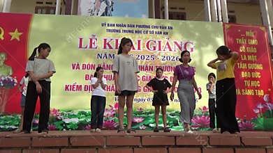 Vietnamese schoolgirls are practicing performing arts to prepare for the opening day of the new school year