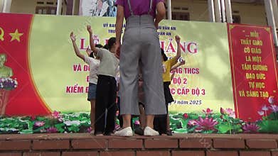 Vietnamese schoolgirls are practicing performing arts to prepare for the opening day of the new school year
