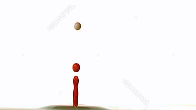 Drop falling against white background