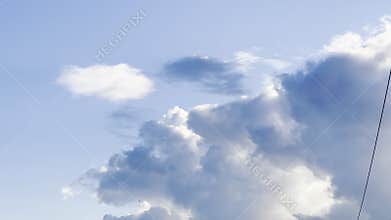 White clouds and blue sky on a sunny day