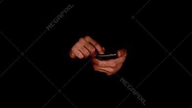 Man holding smartphone, focus on hands and the phone device. Communication technology.