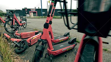 ECHIROLLES, FRANCE - SEPTEMBER 14, 2025 Voi rental electric bikes and scooters