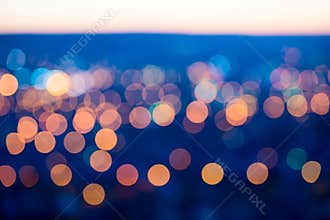 City lights big abstract circular bokeh on blue background