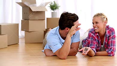 Couple lying on the floor
