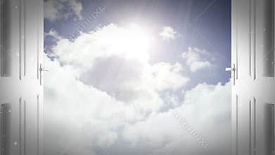 Door opening to reveal blue bright sky