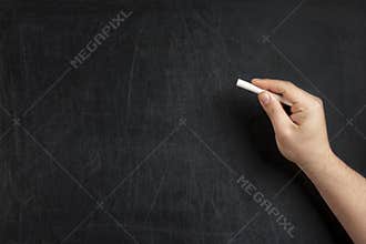 Hand Holding Chalk Blank Blackboard
