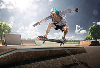 Old Man skating in sunny day