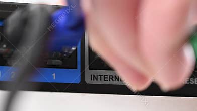 The internet cable is plugged into the router.