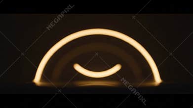 Abstract light formations in diminishing sequence, with glowing arc and semicircle shapes