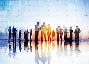 Silhouettes of Business People Discussing Outdoors