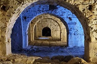 The arched structure of the historic underground crypts of Mytilene Castle on the island of Lesbos, Greece