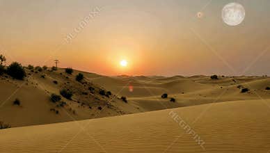 Scenic desert landscape with sand dunes and a vibrant sunset under a sky with two moons