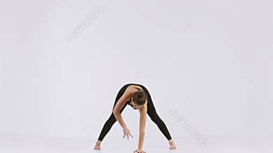 Yoga practice emphasizing stretching in a serene environment