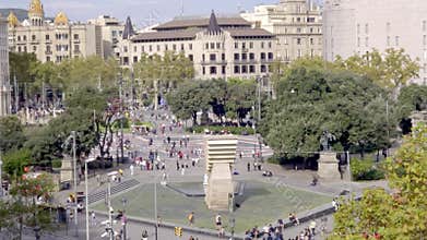 Barcelona, Spain. November 1, 2025, People walking through the bustling Placa de Catalunya in Barcelona