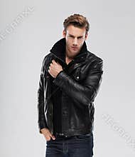 Fashion man, model leather jacket, gray background