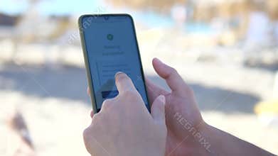 The video shows a close-up of a verified booking notification as a users finger moves across the screen to absorb the