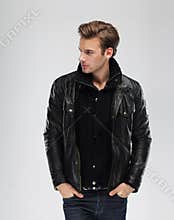 Fashion man, model leather jacket, gray background