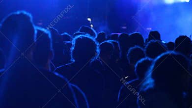 Huge crowd dancing at a DJ show, with great lightning effects. Barcelona