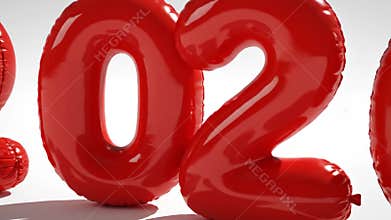 Bold red number balloons forming the year 2026 against white backdrop