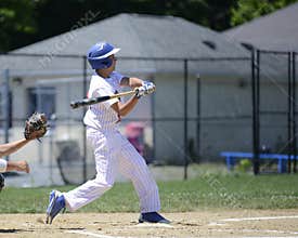 Baseball batter swinging