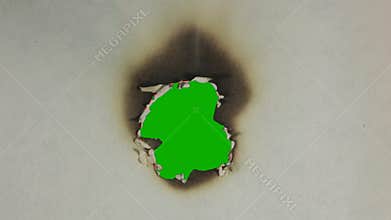 Burning paper. Greenscreen.