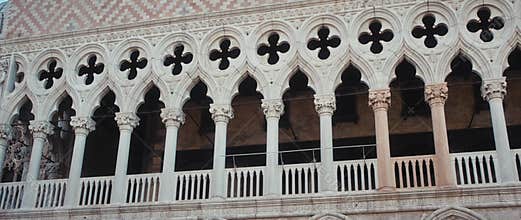 Balustrade with columns on Doge Palace terrace in romantic town of Venice