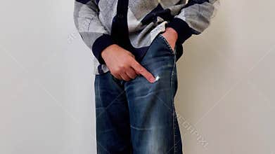 Spotlight on Jeans Flaw: Subtle Wear Mark in Everyday Outfit