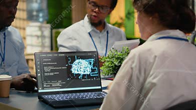 Programmers in office using specialized technology to accelerate AI calculations